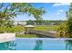 Stunning infinity pool overlooking a marsh landscape, blending luxury with the tranquility of nature at 430 Fish Tale Rd, Charleston, SC 29492
