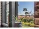 Marsh view from a window with black trim, featuring native vegetation at 430 Fish Tale Rd, Charleston, SC 29492