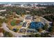 Aerial view of the community features a playground, baseball field, and circular arrangement, ideal for families at 4445 Old Park Rd, North Charleston, SC 29405