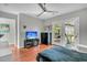 Bedroom features a television, a glass door giving outside access and natural light at 4445 Old Park Rd, North Charleston, SC 29405