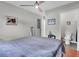 Serene bedroom features a ceiling fan and an ensuite bathroom offering both convenience and privacy at 4445 Old Park Rd, North Charleston, SC 29405