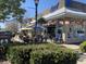 The outdoor seating and colorful umbrellas invite patrons to enjoy a pleasant meal in a vibrant atmosphere at 4445 Old Park Rd, North Charleston, SC 29405