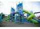 Modern playground featuring climbing structure with slides and netted walkways at 4445 Old Park Rd, North Charleston, SC 29405