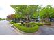 Charming street view with landscaped islands, benches, and storefronts at 4445 Old Park Rd, North Charleston, SC 29405
