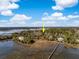 Stunning aerial shot of the waterfront home with private dock at 5010 Timber Race Crse, Hollywood, SC 29449