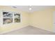 Bright, airy bedroom with neutral carpet and trim; large windows let in lots of natural light at 5010 Timber Race Crse, Hollywood, SC 29449