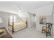 Bedroom featuring a four-poster bed, ceiling fan, and ample natural light at 5010 Timber Race Crse, Hollywood, SC 29449