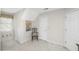 Neutral bedroom featuring a wooden chair and desk, with closet space at 5010 Timber Race Crse, Hollywood, SC 29449