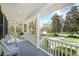 Spacious front porch offering a relaxing outdoor living space at 5010 Timber Race Crse, Hollywood, SC 29449