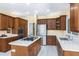 Spacious kitchen with stainless steel appliances, an island cooktop, and wood cabinetry at 5010 Timber Race Crse, Hollywood, SC 29449