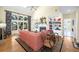 Cozy living room with fireplace, built-in shelving, and natural light at 5010 Timber Race Crse, Hollywood, SC 29449