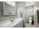 Bathroom with single sink vanity and a decorative mirror at 503 Amberjack Way, Summerville, SC 29485