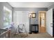 Bedroom with gray walls, white trim, and double white closet doors at 503 Amberjack Way, Summerville, SC 29485
