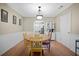 Bright dining room with wainscoting and a view into the kitchen at 503 Amberjack Way, Summerville, SC 29485