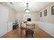 Dining area featuring laminate floors and adjacent kitchen area at 503 Amberjack Way, Summerville, SC 29485