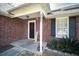 Welcoming front porch with brick facade and decorative accents at home entrance at 503 Amberjack Way, Summerville, SC 29485