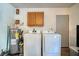 Functional laundry room with a washer, dryer, and cabinet space for storage at 503 Amberjack Way, Summerville, SC 29485