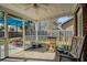 Inviting screened porch perfect for relaxation, featuring comfortable seating and an outdoor space at 503 Amberjack Way, Summerville, SC 29485