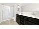 Bathroom featuring double vanity, tile floor, and glass enclosed shower at 509 Purple Finch Rd, Summerville, SC 29486