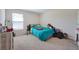 Cozy bedroom features a neutral carpet and natural light at 509 Purple Finch Rd, Summerville, SC 29486
