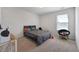Bedroom with carpet flooring, overhead light, and a large window at 509 Purple Finch Rd, Summerville, SC 29486