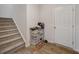 Welcoming entryway featuring wood-look floors, a staircase, and a white door at 509 Purple Finch Rd, Summerville, SC 29486