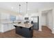Bright kitchen with granite countertops, stainless steel appliances, and a kitchen island at 509 Purple Finch Rd, Summerville, SC 29486