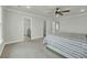 Bright bedroom with a ceiling fan, en suite bathroom and walk-in closet at 5115 Cranesbill Way, Johns Island, SC 29455