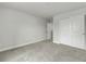 Bedroom featuring neutral carpeting and paint with closet, doorway and base trim at 5115 Cranesbill Way, Johns Island, SC 29455