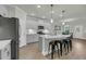 Eat-in kitchen with gray cabinets, stainless steel appliances, and a large kitchen island at 5115 Cranesbill Way, Johns Island, SC 29455