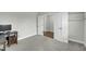 Office with neutral walls, carpet, and a door leading to another room at 5115 Cranesbill Way, Johns Island, SC 29455