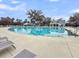 Community swimming pool with splash feature, and lounge seating at 5115 Cranesbill Way, Johns Island, SC 29455
