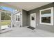 Screened in porch with a door to the backyard and windows to the home at 5115 Cranesbill Way, Johns Island, SC 29455