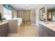 Full bathroom with a glass-enclosed shower, soaking tub, double vanity and soft neutral tones at 523 Verdi Dr, Summerville, SC 29486