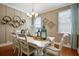Traditional dining room features hardwood floors, unique chandelier and elegant decor at 523 Verdi Dr, Summerville, SC 29486