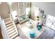 Bright and airy living room featuring a neutral color palette, tall windows, and comfortable seating at 523 Verdi Dr, Summerville, SC 29486