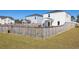Backyard with a well-maintained lawn and a wooden fence providing privacy to the outdoor space at 538 Spanish Wells Rd, Summerville, SC 29486