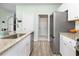 Kitchen with a stainless steel dishwasher, refrigerator, and granite counters at 538 Spanish Wells Rd, Summerville, SC 29486