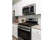 Bright kitchen features stainless steel appliances, granite countertops, and white subway tile backsplash at 538 Spanish Wells Rd, Summerville, SC 29486