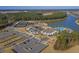 Beautiful aerial view of community with pool, tennis courts, parking and lake at 572 Tidewater Chase Ln, Summerville, SC 29486