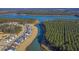 Aerial view of new home construction along a waterway, highlighting community layout and waterfront access at 572 Tidewater Chase Ln, Summerville, SC 29486