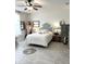 Calm bedroom with neutral tones, wood-look floors, and a comfortable bed at 572 Tidewater Chase Ln, Summerville, SC 29486