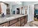 Spacious bathroom features dual vanities, granite counters, and ample storage at 614 Battery Edge Dr, Summerville, SC 29486