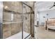 Updated bathroom features a glass-enclosed shower and neutral tile at 614 Battery Edge Dr, Summerville, SC 29486