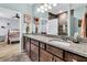 Bathroom with dual vanities, granite countertops, and updated fixtures at 614 Battery Edge Dr, Summerville, SC 29486