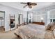 Comfortable bedroom featuring a ceiling fan, wall art, and natural light at 614 Battery Edge Dr, Summerville, SC 29486