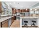 A modern kitchen with stainless steel appliances, countertops, and a stylish island at 614 Battery Edge Dr, Summerville, SC 29486