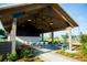 Stunning common area with spacious seating under a timber framed roof and beautiful landscaping at 706 Rumbling Leaf Ln, Summerville, SC 29486