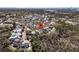 An aerial view highlights a desirable neighborhood, complete with mature trees and proximity to waterways at 740 Stucco Ln, Mount Pleasant, SC 29464