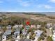 Beautiful aerial view of waterfront homes in a residential neighborhood with lush greenery and marsh views at 740 Stucco Ln, Mount Pleasant, SC 29464